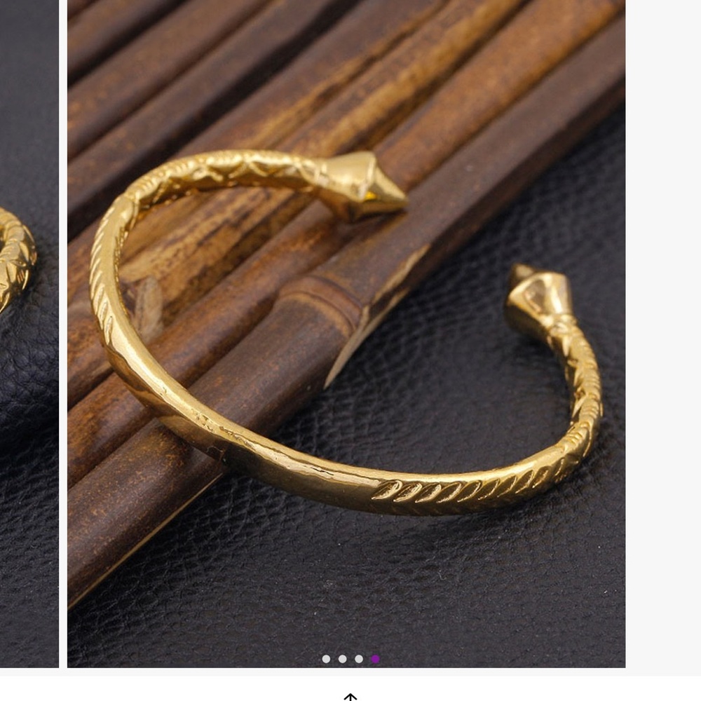 Gold tone bangle